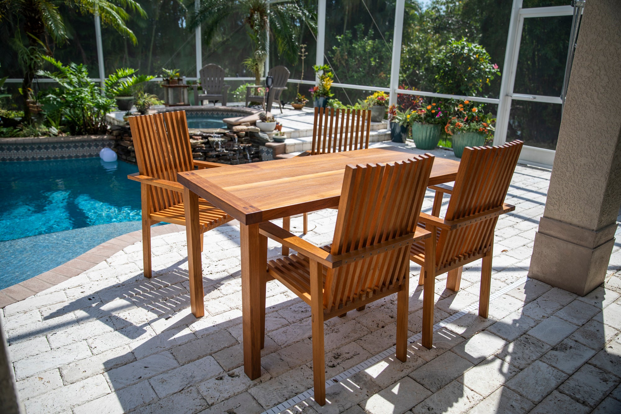 The Teak Outdoor Dining Set, A Table and Four Chairs
